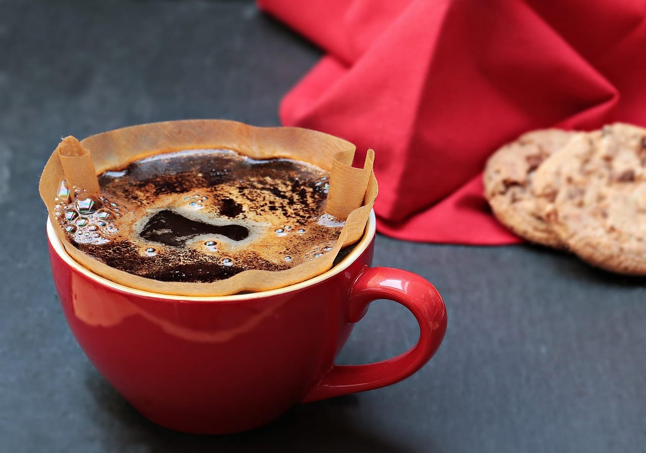The bloom: fresh coffee rises and bubbles as gas escapes.